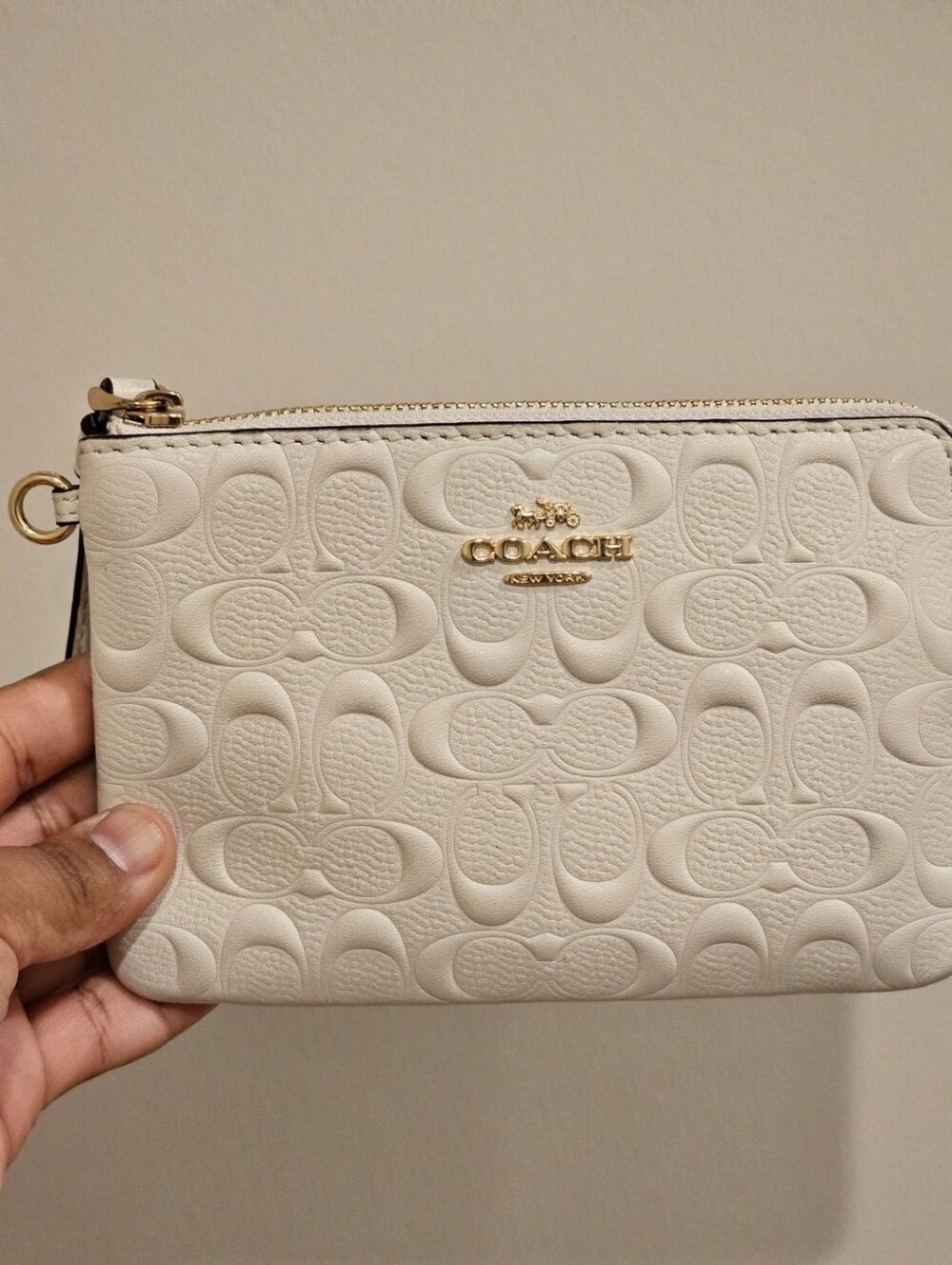 Coach Wristlet zip bag in Signature leather